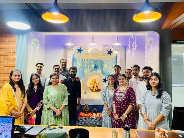 The team celebrating a festival at the office