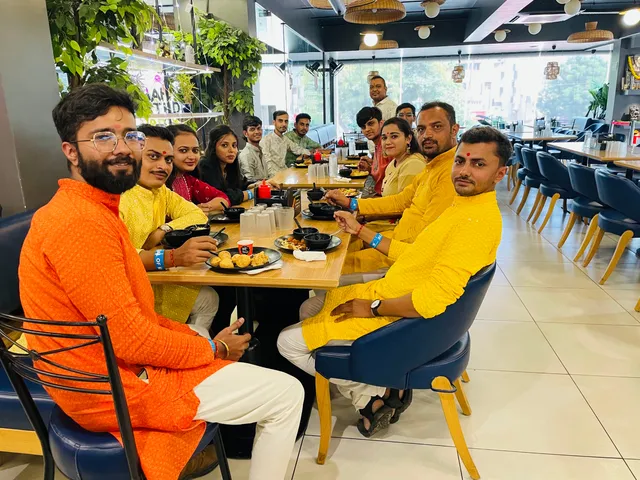 The team at a festival lunch together
