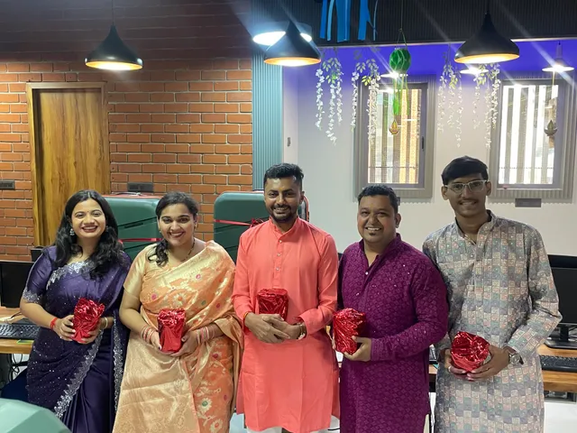 The team exchanging Diwali gifts