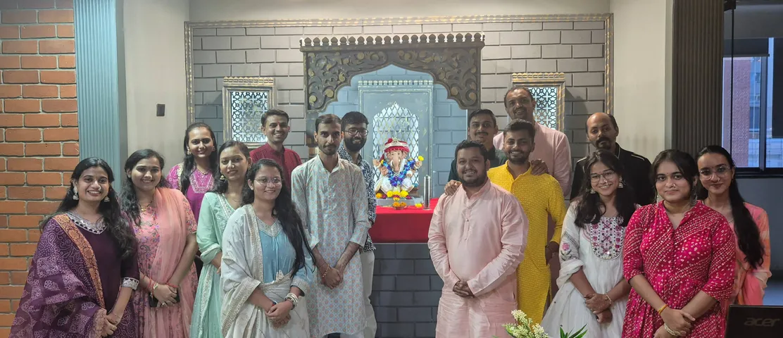 The team celebrating Ganesh Chaturthi at the office